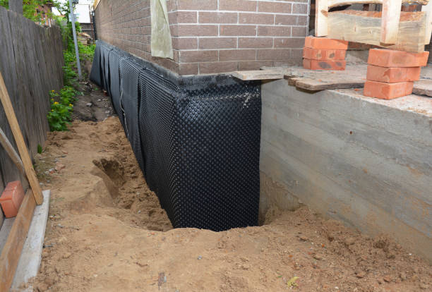 Happy homeowners after waterproofing job in Cranford